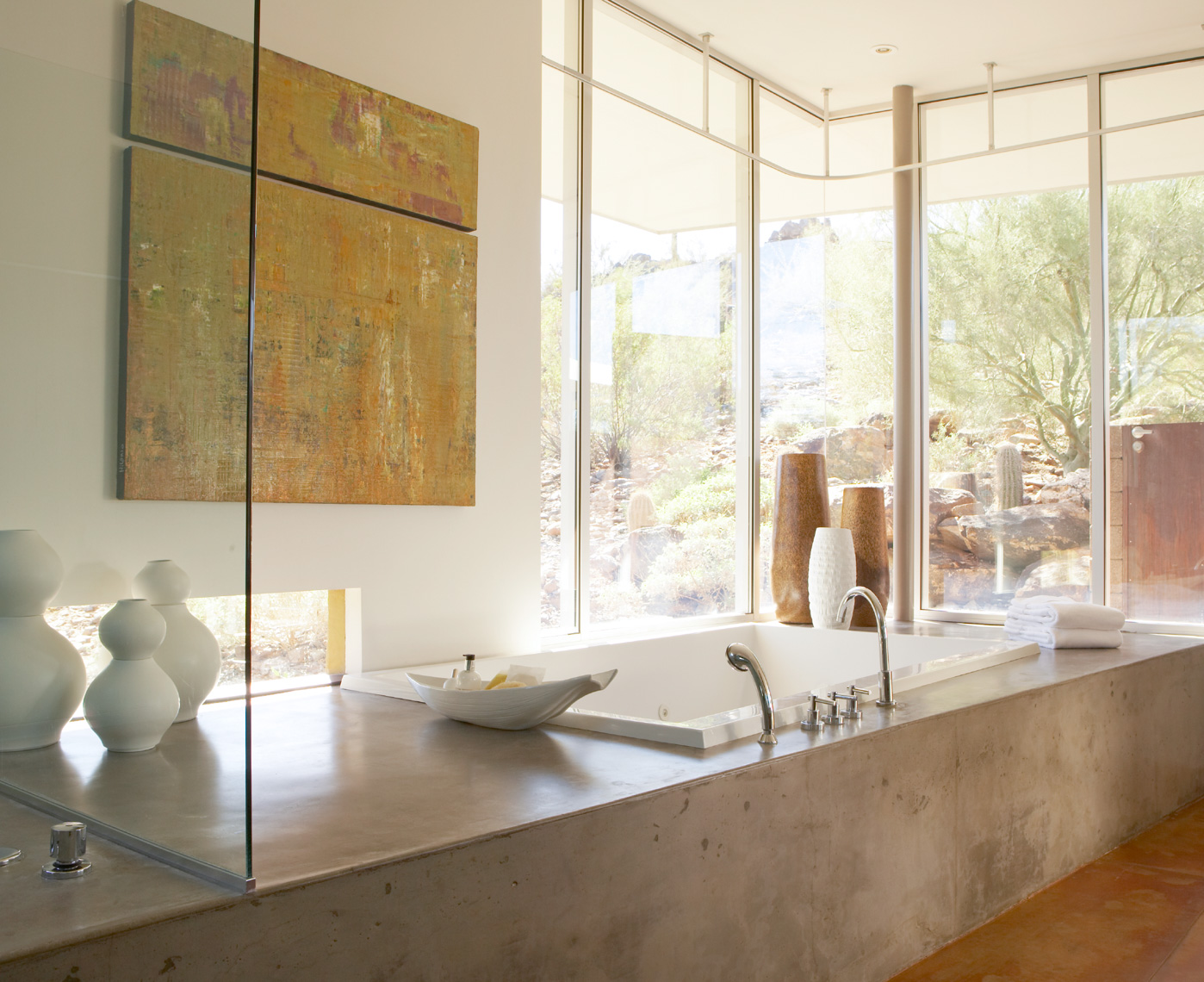 bathroom interior with white bathtub in concrete slab and windows San Francisco interior photographer