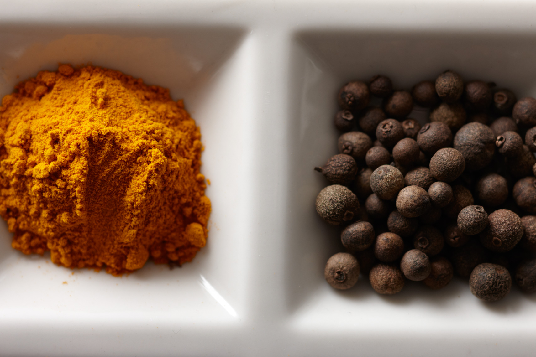 closeup of peppercorns and ground cinnamon San Francisco food photographer