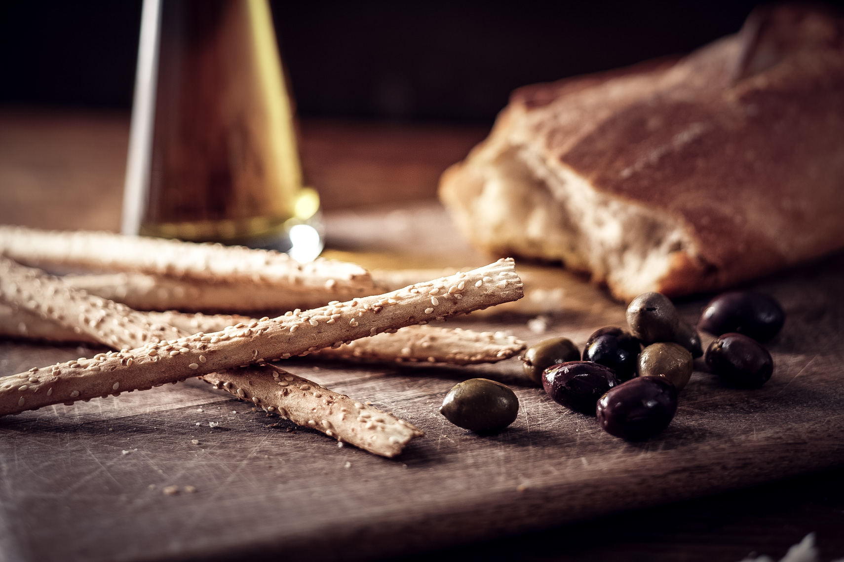 sesame breadsticks and olives with bread and olive oil San Francisco food photographer