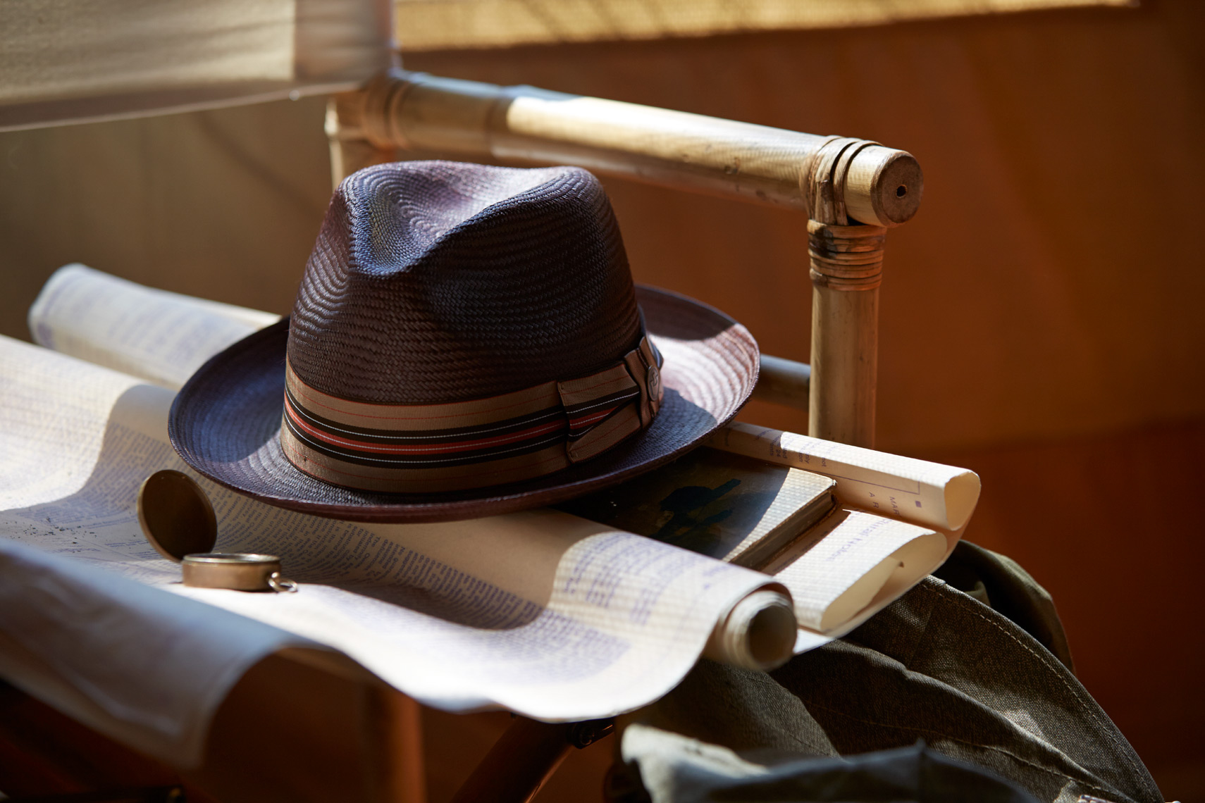 brown hat on chair with map and compass San Francisco product photographer