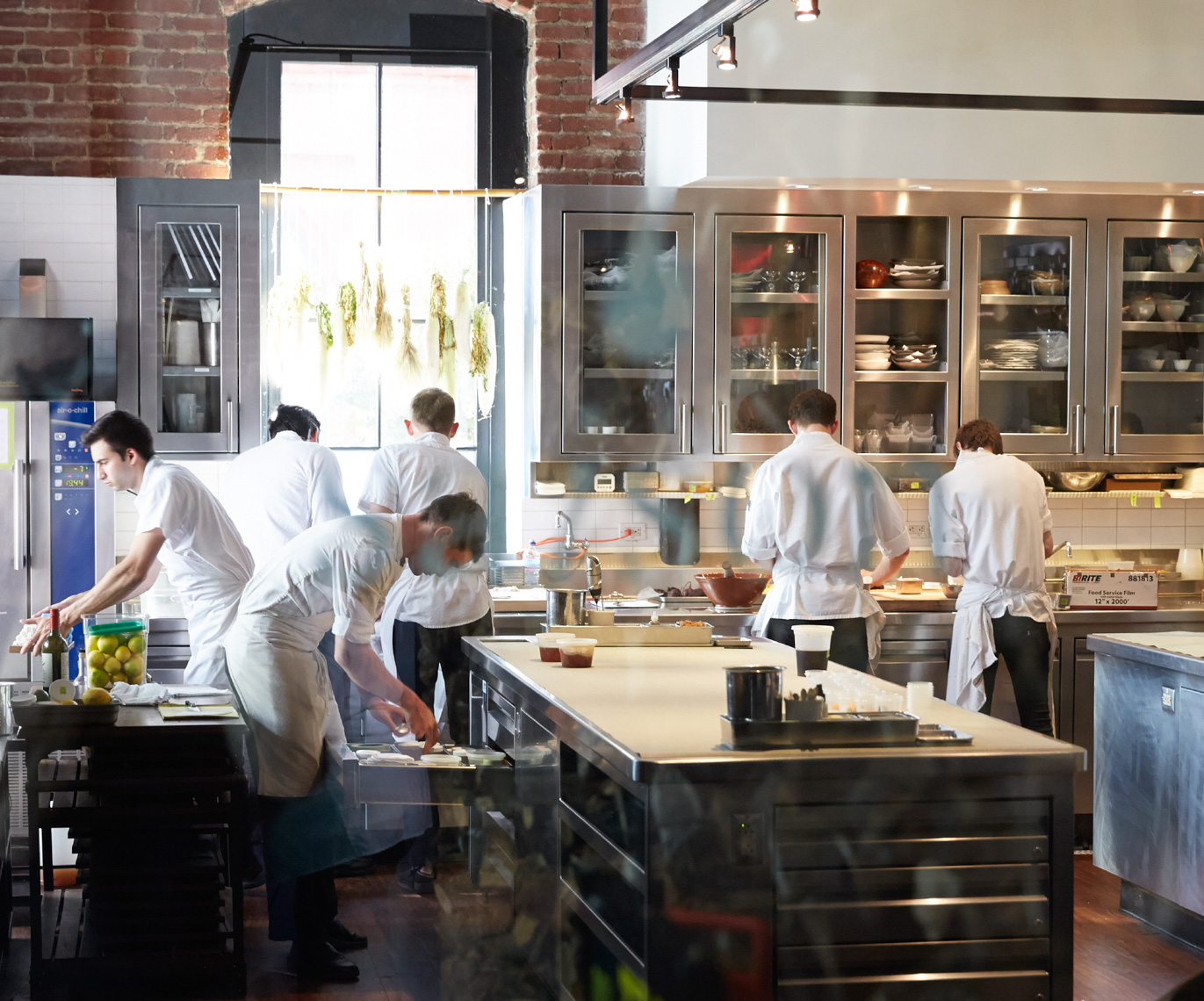 Restaurant staff in white prepping in commercial kitchenSan Francisco lifestyle photographer