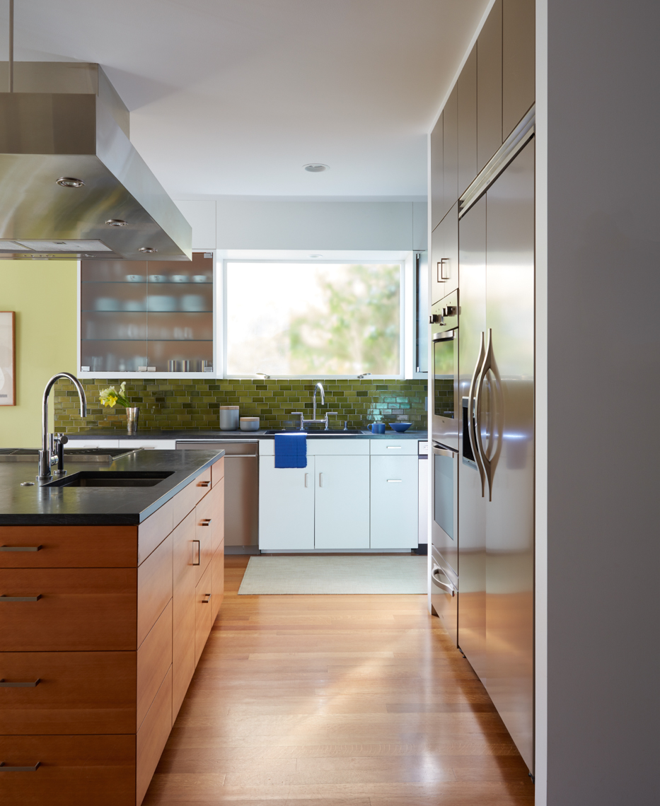 kitchen interior with wooden floors and cabinets and stainless steal refrigerator and appliances San Francisco interior photographer