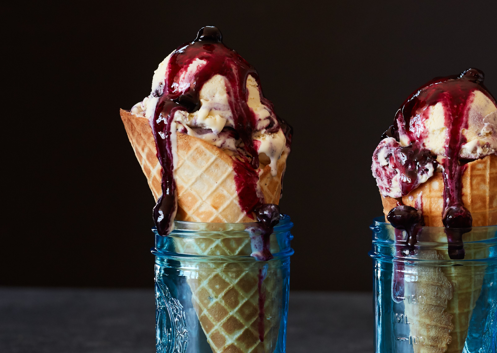 blueberry vanilla ice cream in waffle cones with dripping blueberry compote sauce San Francisco food photographer