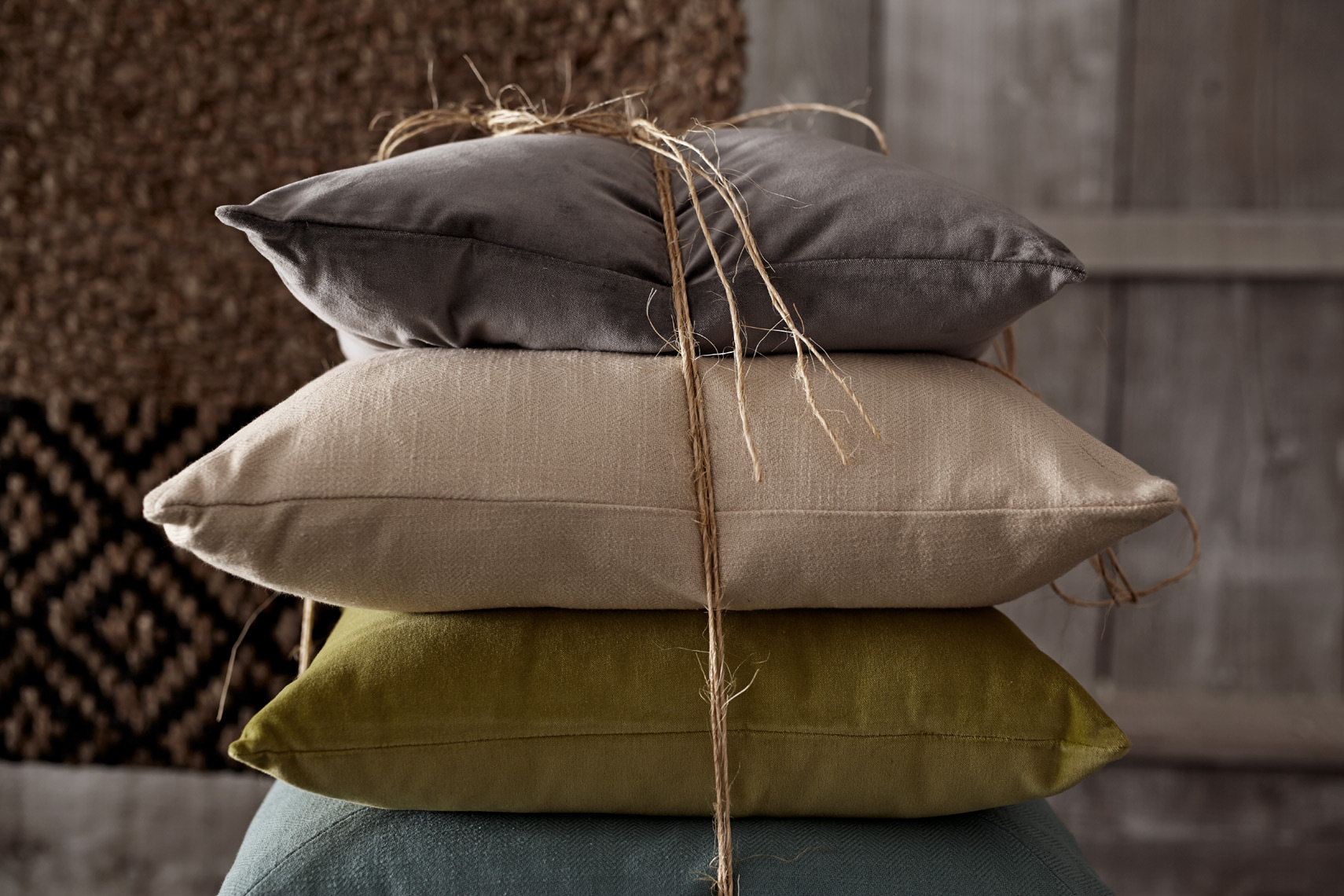 4 colorful pillows stacked and wrapped with string San Francisco product photographer