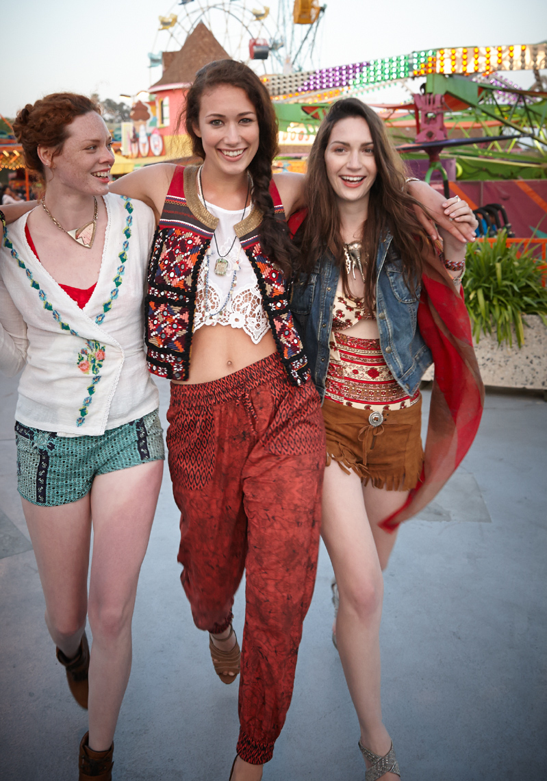 Three young women strutting through an amusement park in colorful clothing San Francisco lifestyle photographer